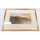 Watercolour lake scene with paddle boat, signed.