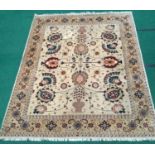 Room size beige patterned carpet. 300 x 240cms.