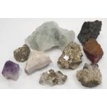 A collection of nine assorted crystals to include Amethyst.