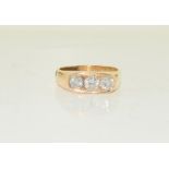 An 18ct yellow gold diamond three stone ring of 1.25cts approx. Size Z.