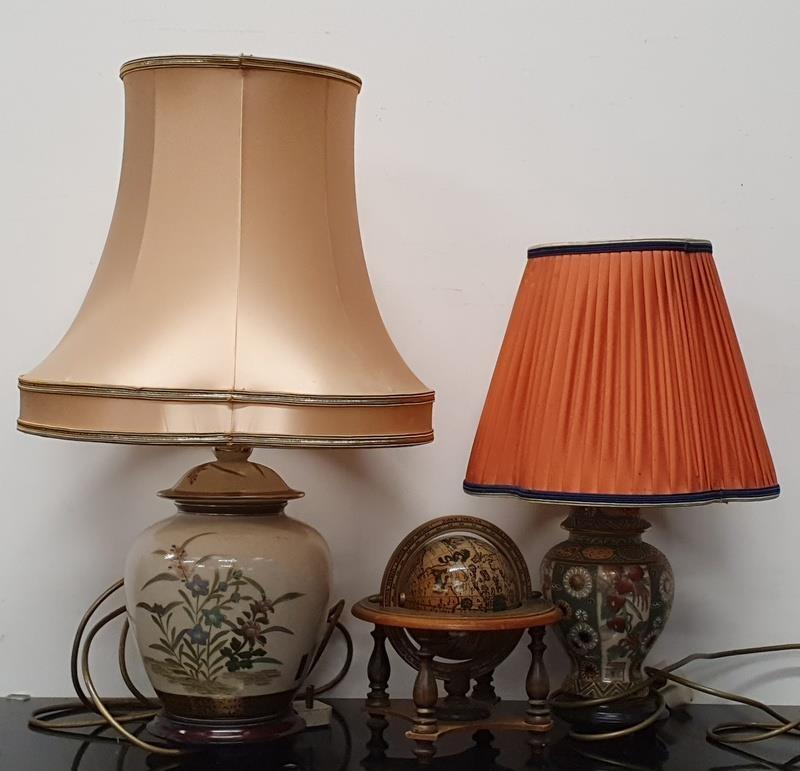 Two oriental table lamps together with a miniature wooden globe.