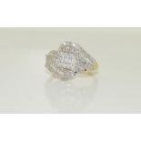 A 9ct gold ladies diamond sweep ring, appox 1ct, Size S.