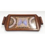 A twin handled mahogany inlaid breakfast tray with butterfly wing decoration to centre.