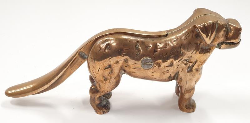 A solid brass anrique nut cracker in the form of a dog. - Image 2 of 3