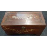 Camphor wood inlaid trunk with fitted inside and lock.
