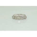 A Good 18ct white gold five stone diamond ring of 1.7cts approx. Size O.