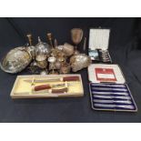 A box of assorted silver and silver plate.