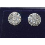 A good pair of 18ct white gold diamond cluster earrings of 2.1cts approx.
