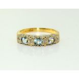9 carat gold ladies aquamarine and diamond band ring, Size N.