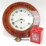 A vintage wall clock together with a boxed Ice Watch.