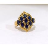 A 9ct gold ladies Diamond and Sapphire ring. Size P.