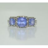 9ct white gold tanzanite ring. Size O.