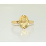 An 18ct gold tested single stone Citrine ring of over 3cts, Size N.