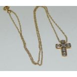 9ct gold and diamond cross pendant and chain. 2.5g