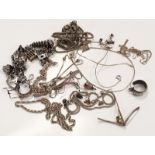 Quantity of ladies silver jewellery to include a charm bracelet and charms.
