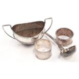 Quantity of silver, to include two handled sugar bowls and two serviette rings.