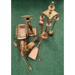 A collection of assorted brassware.