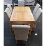 Oak dining table and 6 chairs.