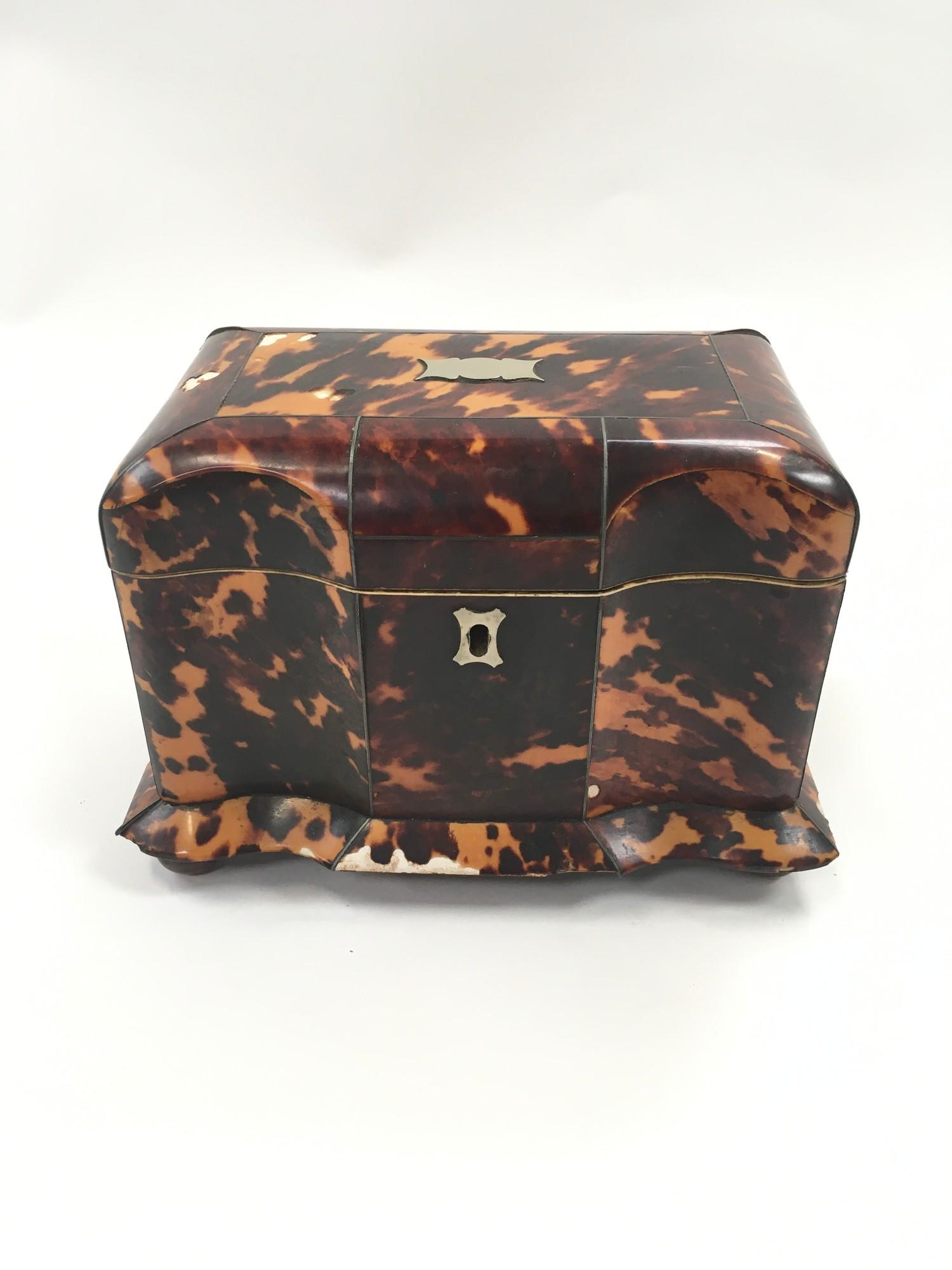 Tortoiseshell tea caddy.