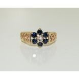 A 9ct gold antique set sapphire and diamond ring, Size M.