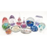 A collection of paperweights to include millefiori Murano castelino.