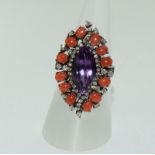 Large coral amethyst and diamond ring in white metal. Size M.