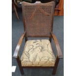 Vintage oak bedroom chair with rattan back.