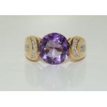 A 9ct gold ladies Amethyst ring, size M.