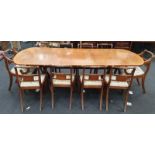 Edwardian mahogany dining table with centre leaf together with ten matching chairs to include