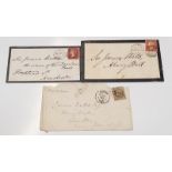 Two penny red stamps on original envelopes.