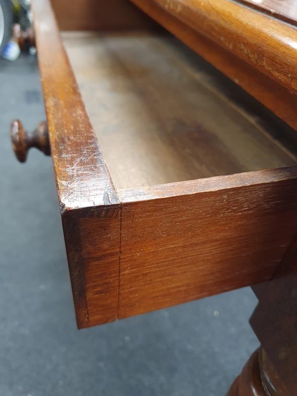 Victorian mahogany two drawer writing desk on turned supports with porcelain castors. - Image 4 of 6