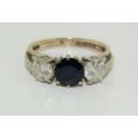 A Diamond/Sapphire thress stone 18ct gold ring approx. 0.50pts each diamond approx 0.75cts