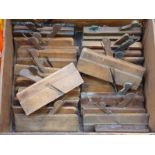 A good collection of woodworkers wooden shaping planes (20).
