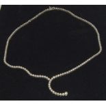 A good 18ct white gold diamond necklace the articulated line set with 31 round brilliant cut