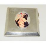 A circa 1927 silver case with enamel semi nude image in the Art Deco style.