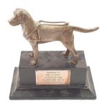 A guide dogs trophy with model of a dog to top.