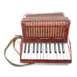 A bell 12 key accordion.