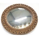 Gilt frame convex mirror. 55cm diameter.