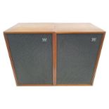 A pair of Wharfedale Denton speakers with wood surrounds.