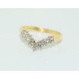 18ct gold ladies diamond wishbone ring. Size N