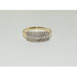 9ct gold baguette and round cut diamond ring. Size N.