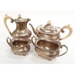 Silver hallmarked four piece tea set, total weight 1657g including handles.