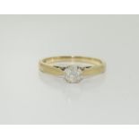 A 9ct gold ladies solitaire ring H/M 0.33ct ring, Size P.