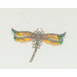 A silver and plique a jour dragonfly brooch.