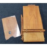 A large wooden boxed sketch box easel.