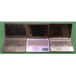 Three Laptops: Acer Aspire P5WE0, Asus X502C, Dell P28F (WP98).