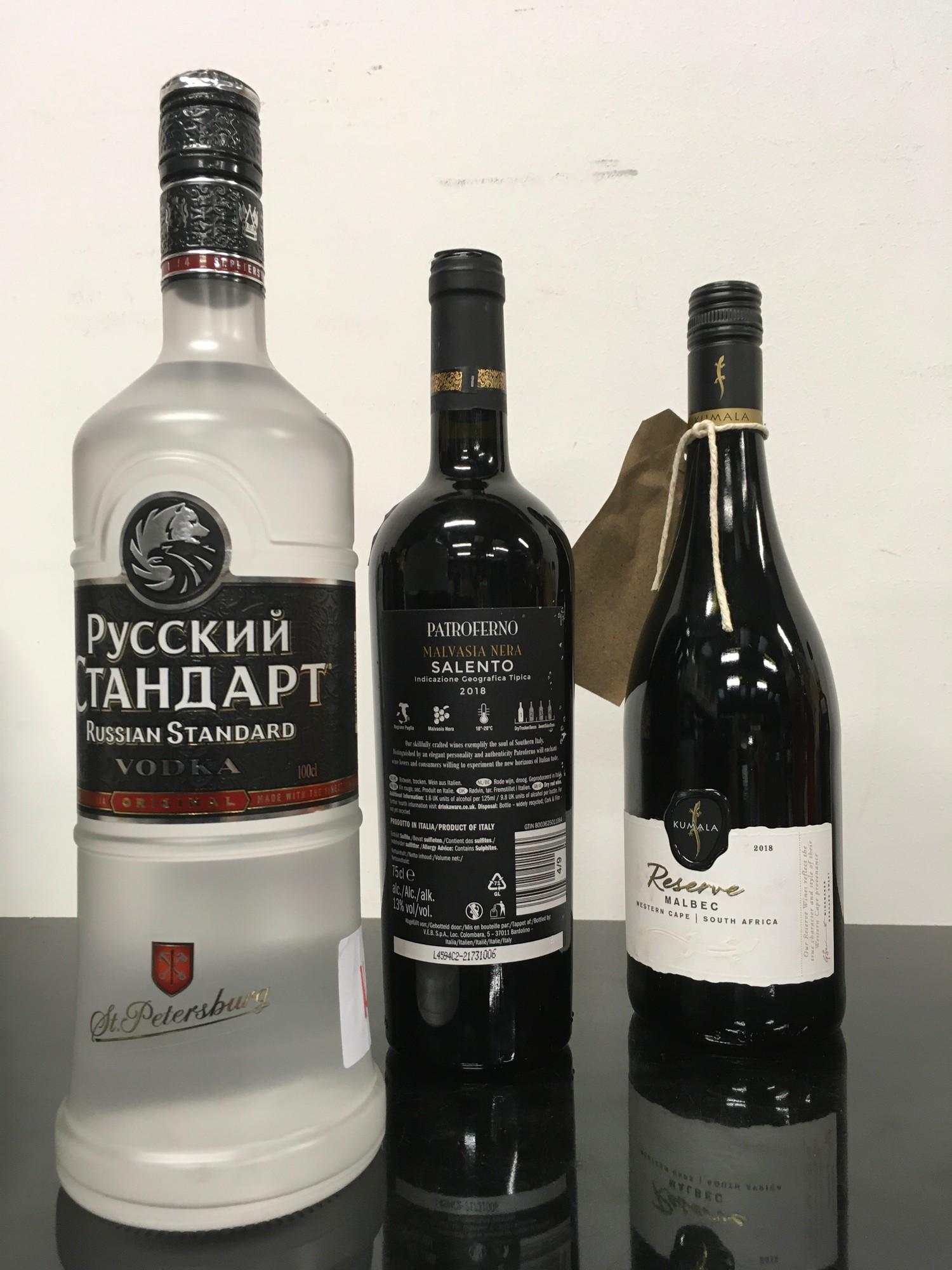 Three bottles of alcohol (REF 143, 75, 142).