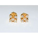 A pair of diamond earrings, approx 1.4ct set in 22ct gold with screw backs.