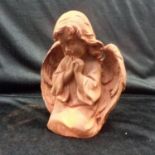 A cast iron statue of a kneeling praying angel.(HI147).