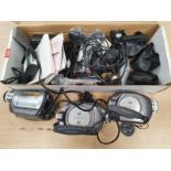 Three Panasonic camcorders with leads (REF C23).